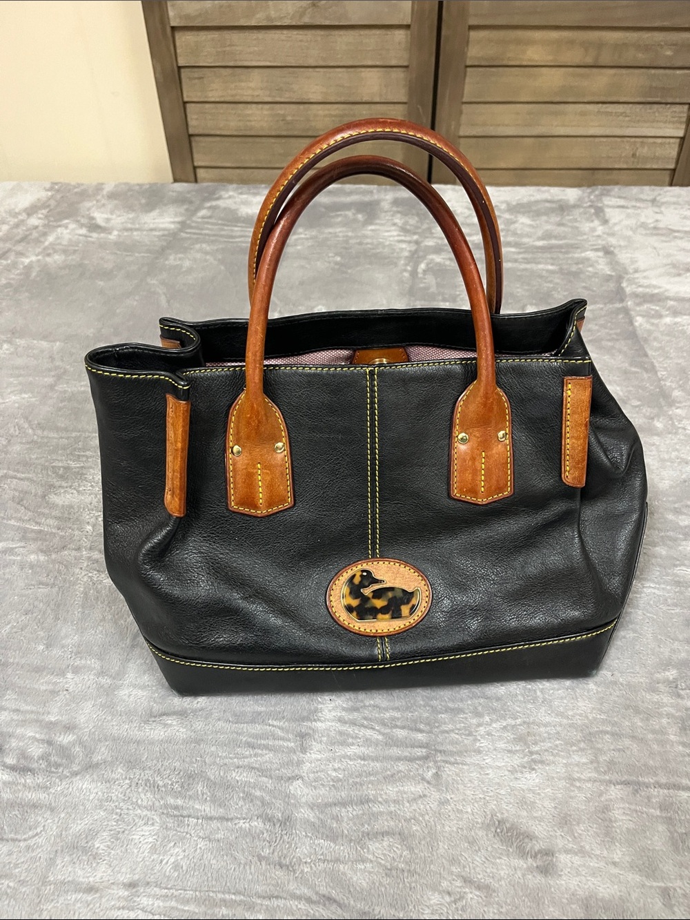 Dooney & Bourke Black Leather Tote with Brown Trim